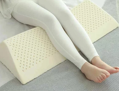 膝蓋下放枕頭高度